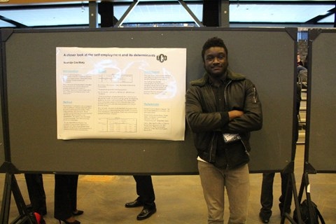 A student presenter showcases his project at ORD 2017 at the Central National Bank Center in Enid.