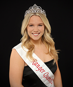 Headshot of Ranger Queen Jaxyn Cloud wearing her crown and sash with a black dress.