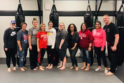 Students from Northwestern Oklahoma State University’s Woodward campus participated in the Social Workers Association of Tomorrow (SWAT) “Self-Defense Night” at the RYSE Academy of Mixed Martial Arts in Woodward to learn more about self-defense techniques.