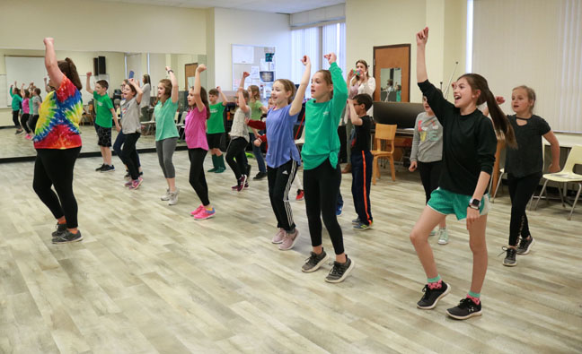 Children’s choir members learn choreography for the musical “Joseph and the Amazing Technicolor Dreamcoat” from Erin Davis. The show will take place in Herod Hall Auditorium on April 11-12 at 7 p.m. and April 13 at 2 p.m.