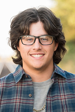 Headshot of 25-26 NWOSU PLC member Nik Ramos