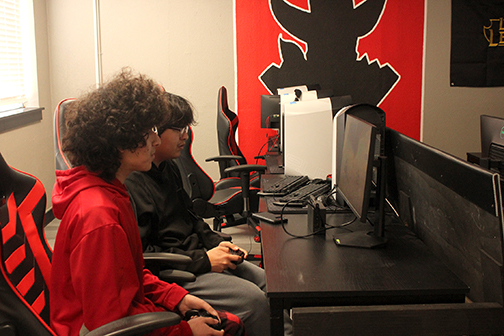 middle school students playing competing in an esports tournament in the NWOSU Esports venue.