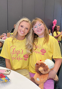 Miss Northwestern 2025 Jessica Davis (left) and Miss Northwestern’s Star Lawsyn Howard (right) smile for the camera during an event.