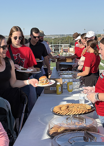 Families were treated to a free tailgate dinner of hamburgers and hotdogs and all the sides before the start of the Ranger football game, courtesy of sponsor Energy Transfer.