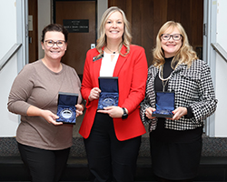 Northwestern’s 15-year service award recipients are Dr. Mindi Clark (left), Dr. Leslie Collins (center) and Mistie Kline (right).
