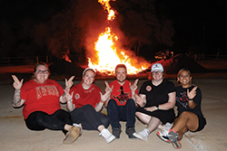 Members of the 2024 Northwestern Student Government Association (left to right) Harlie Altland, Chloe Bradt, Brayden Stoner, adviser Kaylea Brown, and America Rios at the Homecoming Bonfire. This year’s homecoming bonfire is Monday, Oct. 20.