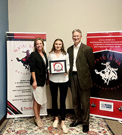 Jenna Maier (center), an Alva senior social work major, was one of the first Northwestern students to earn the Infant and Early Childhood Mental Health Micro-Credential from Dr. Kylene Rehder (left), Northwestern Department of Social Work chair and Infant & Early Childhood Mental Health Academy director, and Dr. Steven Maier (right), Northwestern Dean of Faculty.