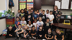 Serah Watson, fourth-grade teacher and inaugural recipient of the “Teach Like a Ranger” recognition, pictured in her classroom at Adams Elementary in Enid.