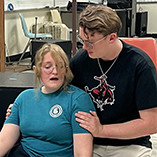 Lead characters Jaden Matthews (left as Audrey) and Lucas Wood (Seymour) rehearse a scene for Northwestern’s upcoming musical, “Little Shop of Horrors.” The production is April 23-24 at 7 p.m. and April 26 at 2 p.m. in Herod Hall.
