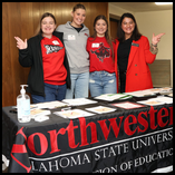 Northwestern Oklahoma State University Division of Education students (left to right) Janie Rempel, Teagen Wright, and Kate Mann pose with Northwestern instructor of education Yesenia Buckhaults (right) at the 2025 Future Educators Day.