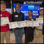 Northwestern News staff attending the Oklahoma Collegiate Media Association Conference on April 1 show off seven first-place awards. 