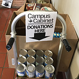Photo from a recent food drive in Percefull Fieldhouse showing non-perishable foods that had been donated.