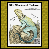 Conference poster showing a collared lizard illustration on rocks with 