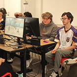 Students at computers playing video games.