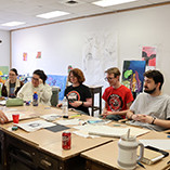 Visual art seniors preparing for their art exhibitions.
