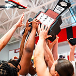 Lady Rangers holding up the GAC Trophy.