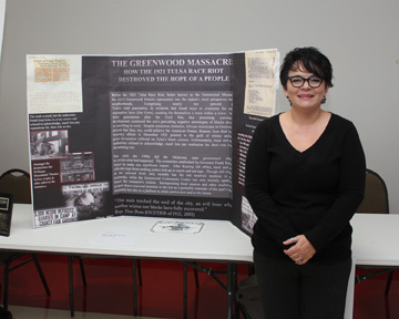 Brandy Hinesley with research poster