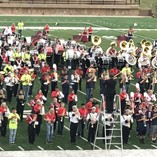 band on football field at homecoming