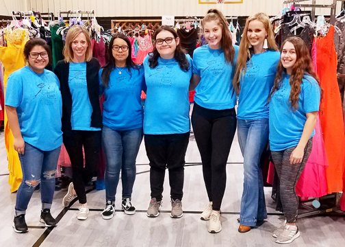 Woodward High School Key Club members helping with Primp for Prom include (left to right) Xiomara Guzman, Dr. Kylene Rehder-chair of the department and professor of social work at Northwestern, Fatima Flores, Christol Ruttman, MaKenzie Miller, Abby Billings and Crystal Standridge.