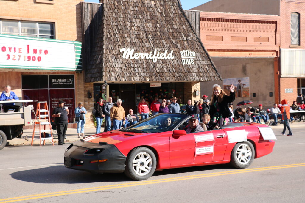 Winner of the Miss Cinderella 2019 pageant, Carli Seabolt of Perry, waves to the crowd during Northwestern Oklahoma State University’s 2019 Homecoming Parade.