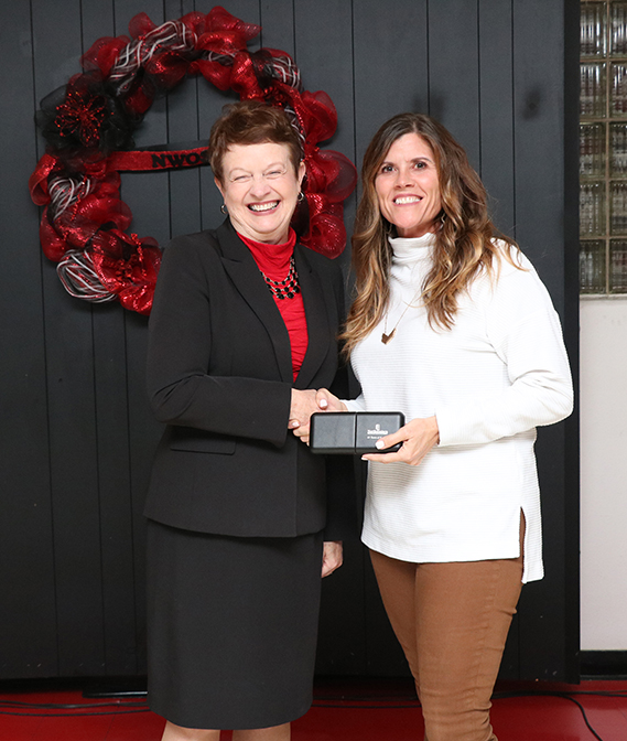 (Right) Leeta Grimsley, Northwestern’s Information Technology assistant director and systems specialist, receives her 20-year service award from university president, Dr. Janet Cunningham.