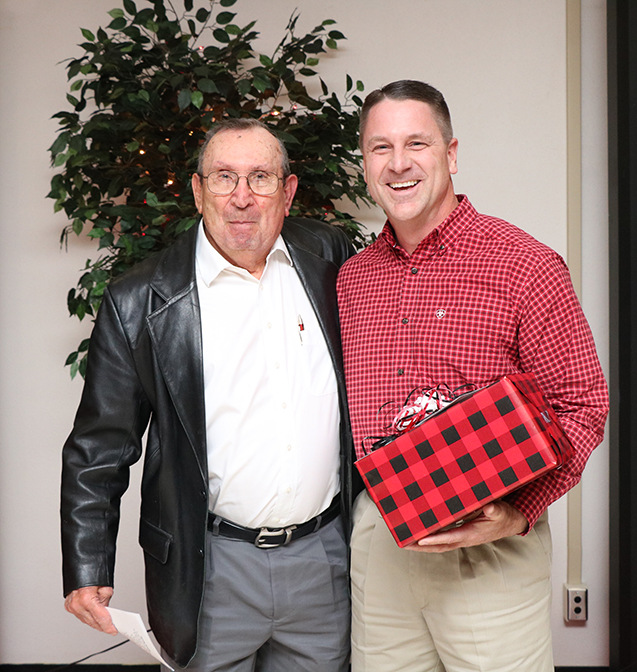 (Right) Dr. Dean Scarbrough, agriculture department chair and professor of agriculture, was presented the John Barton Distinguished Teaching and Service Award from its namesake.