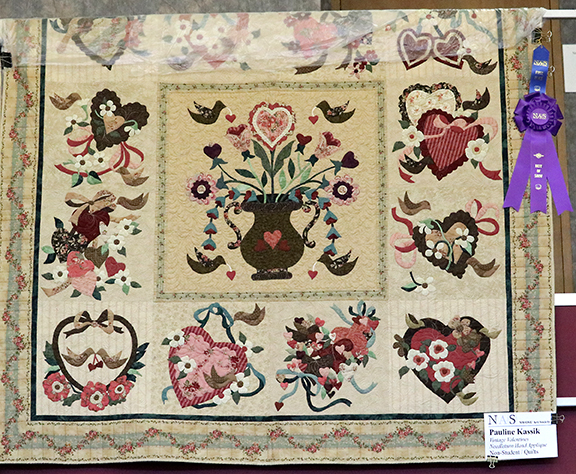A quilt named “Vintage Valentines Needle-turn Hand Applique” by Pauline Kassik of Carmen is the Best of Show winner in the non-student division of the 2022 NWOSU Art Society Art Show.
