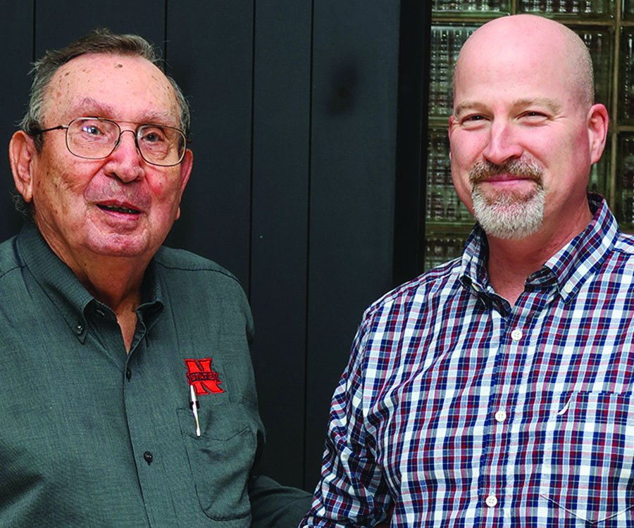 John Barton Award: Dr. Aaron Mason (right) was presented with this year’s John Barton Distinguished Teaching and Service Award from the award’s namesake, John Barton.