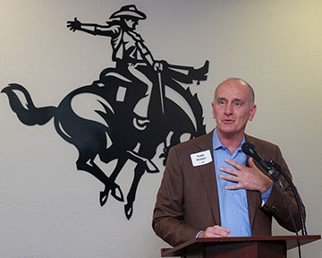 Local businessman Todd Holder addresses the crowd in his capacity as OMRF local co-chair.