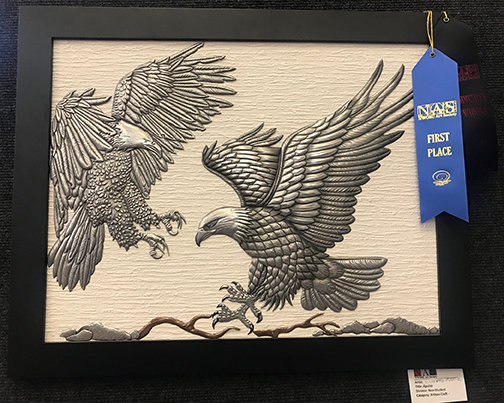 The Non-Student Division Award winner for those who are current/retired employees or alumni is Victoriano Muniz-Mendoza for his Artisan Crafts piece titled “Aguilas.”