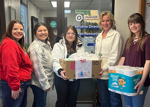 Northwestern Social Workers Association of Tomorrow (SWAT) members deliver personal hygiene items to the Northwest Center for Behavioral Health in Woodward, which were recently collected during the “Compassion in Action” Dignity Drive at all three campuses. Pictured are (left to right) students Krystan Pierce, Nicole Posada, Alyssa Ball, executive director of Northwest Center for Behavioral Health (NCBH) Autumn Nickelson and Morgan Sanders.