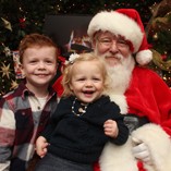 Santa, little girl and boy