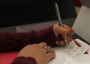 Hand Holding Pen