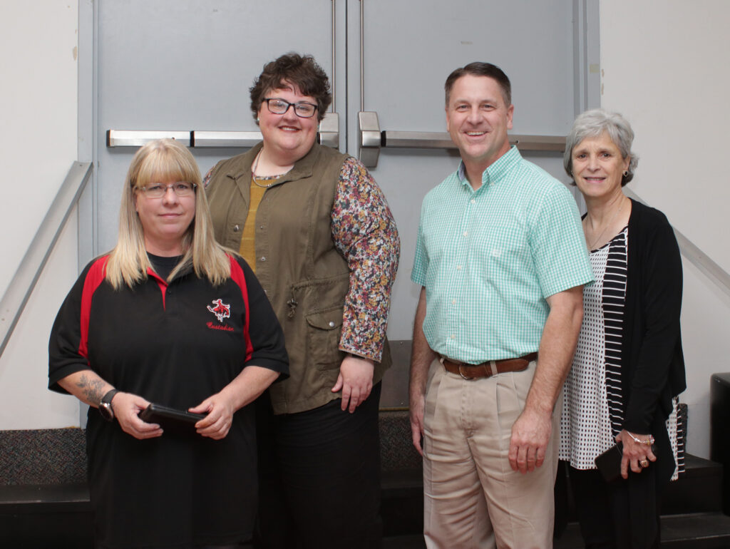 Northwestern’s 20-year service award recipients are (from left to right) Darcie Obermeier, Dr. Dena Walker, Dr. Dean Scarbrough and Kimberly Weast.