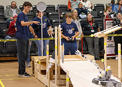Students from Arnett High School compete in the final round of the Heartland BEST Robotics Game Day Contest.