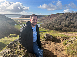 Northwestern senior John Cloud looks over Three Cliffs Bay in Swansea, United Kingdom.