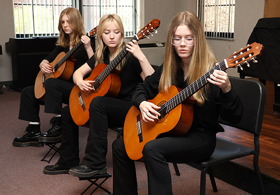 Liberty Fulmer, Paige Adams and Elaina Atherton from Enid High School were members of the top high school ensemble performance during the Northwestern Oklahoma State University Guitar Festival March 31 in Alva.