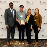 (Left to Right) Dr. Angelo McClain, CEO of NASW is pictured with Jonathan Wales, NASW-OK BSW Student of the Year, alongside social work faculty, Dr. Kylene Rehder and Jennifer Pribble.