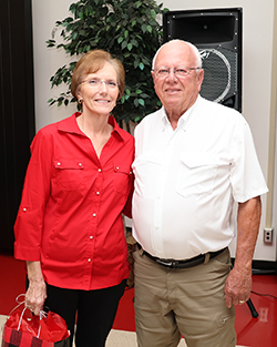 Thelma Crouch Staff Employee of the Year Award winner Sue Marker (left) was joined at the 2025 Northwestern Employee Recognition Ceremony by her husband Earl Marker (right) on Nov. 11 at the Northwestern-Alva campus.