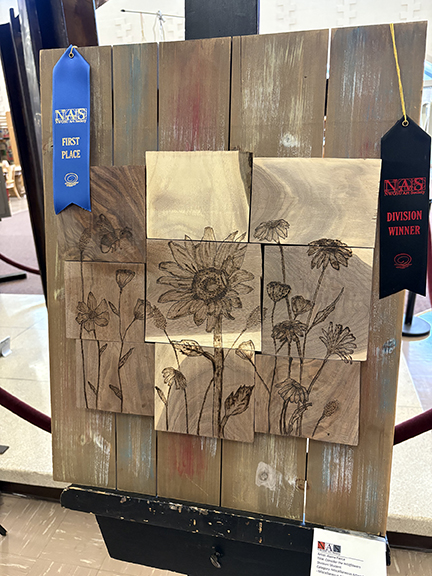 A piece in the Miscellaneous category by Elaina Pierce is the winner of the People’s Choice award during the Northwestern Art Society Art Show. This piece was voted the favorite by those who visited the show.