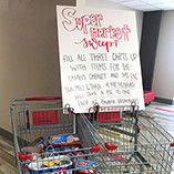 Pies to the face reward for full shopping carts in three-campus food drive at Northwestern