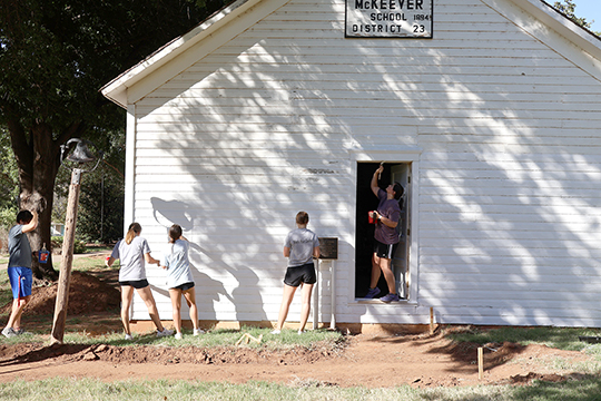 Members of the Northwestern Oklahoma State University President’s Leadership Class took advantage of a nice weather day recently to paint the outside of the McKeever School Building, a one-room schoolhouse that sits on the Alva campus. This was an early project for Kindness Day in Northwest Oklahoma. The group also plans to help the Lutheran Church prepare for its annual fundraiser dinner in early November.