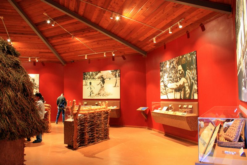 Visitors explore the interior of the Spiro Mounds Archaeological Center. Photo courtesy of TravelOK.com.