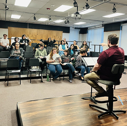 “Little Shop of Horrors” cast members rehearse songs from the musical during a recent session led by the production’s musical director Kane Bradley. The performances will be April 23-24 at 7 p.m. and April 26 at 2 p.m. in Herod Hall.